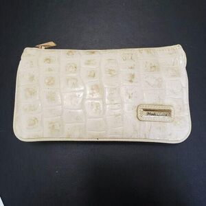 Madi Claire cream colored leather crossbody bag